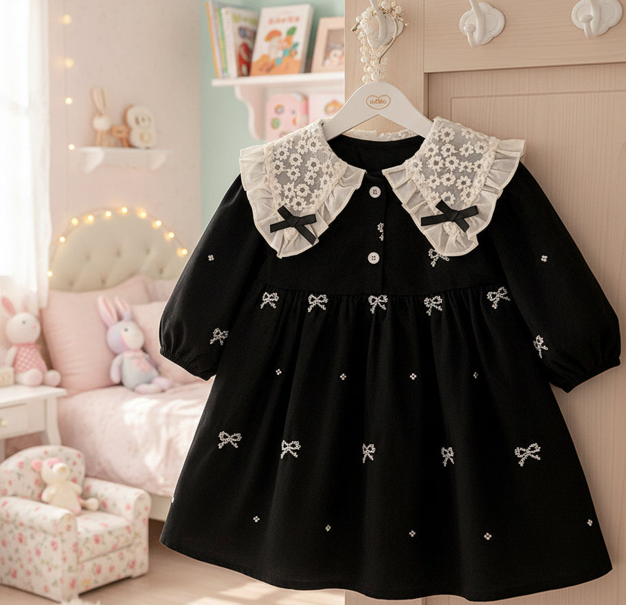 Robe/combinaison noire pour bébé fille