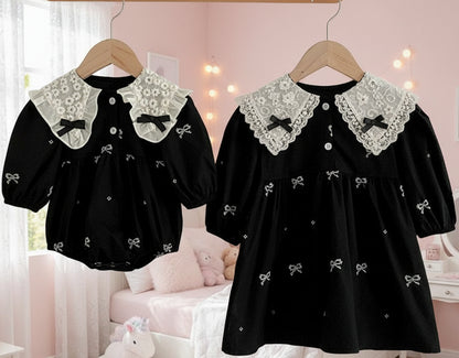 Robe/combinaison noire pour bébé fille