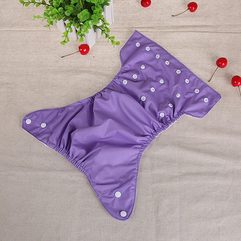 حفاضات أطفال قابلة لإعادة الاستخدام بأزرار ملونة